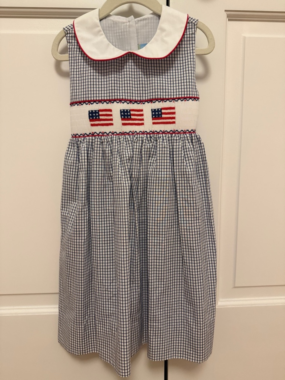 Girls' Navy Gingham Smocked Dress with Flag Detail
